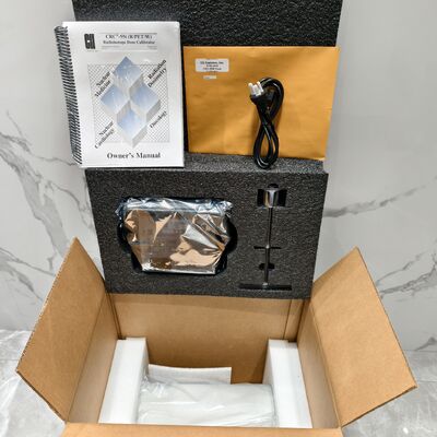 Calibrateur de dose ergonomique pour une exposition réduite aux rayonnements dans les cellules chaudes